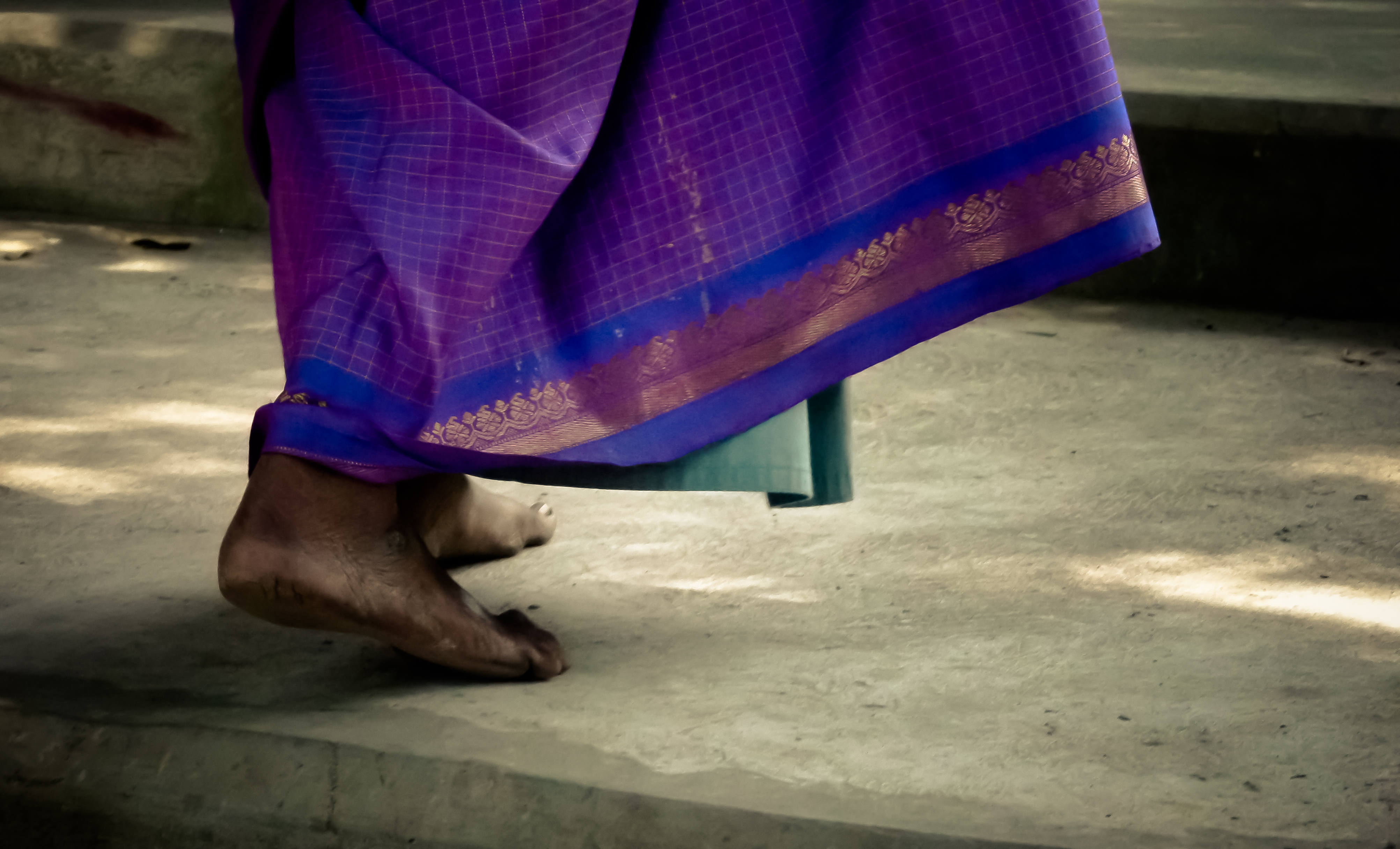 Purple sari in movement